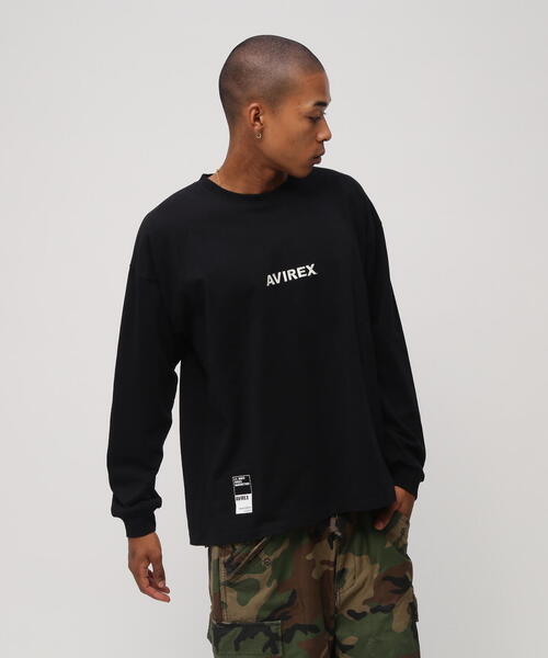 AVIREX(アヴィレックス)の「《WEB&DEPOT限定》CORE LOGO L/S T-SHIRT / コアロゴ 長袖Tシャツ(Tシャツ/カットソー・レディース・ホワイト系2/その他/ダークグリーン系/ブラック・F)」の1枚目の写真