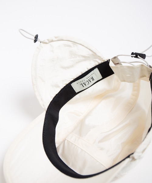 RACAL(ラカル)の「Ear Tab Shiny Summer Cap / 耳当て付きシャイニーサマーキャップ(キャップ・レディース・ネイビー/アイボリー/ブラック・FREE)」の11枚目の写真