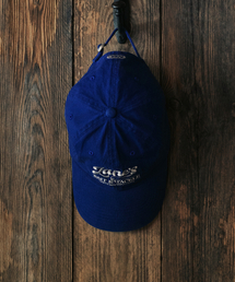 FRIZMWORKS（フリズムワークス）の「ZANES BAIT & TACKLE LOGO BALL CAP _ BLUE（キャップ）」