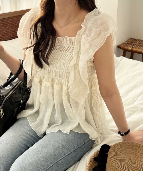 nelliy.（ネルリー）の「フリルシャーリングシアーブラウス