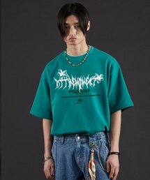 AT THE MOMENT（アットザモーメント）の「Flower Logo Pigment Short Sleeve Tee (VINTAGE GREEN)（Tシャツ/カットソー）」