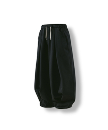 ANGLAN（アングラン）の「Valley Tuck Sweat Balloon Pants - Black（スウェットパンツ）」