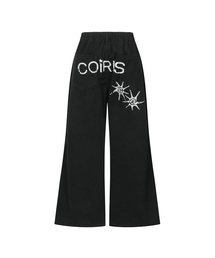 COIRIS（コイリス）の「ドレンバッグダーティロゴパラシュートコットンパンツ 男女共用 (2カラー)（その他パンツ）」