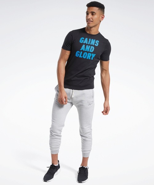 Reebok(リーボック)の「グラフィック ショート スリーブ Tシャツ /Graphic Short Sleeve Tee(Tシャツ/カットソー・メンズ・ブラック・X-SMALL/X-LARGE/SMALL/LARGE/MEDIUM/XX-LARGE)」の5枚目の写真