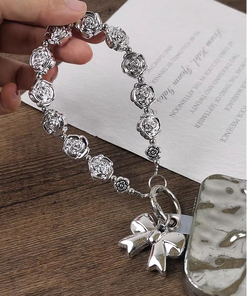 LA VORAGINE(ラ ヴォラジネ)の「ハートリボンモチーフ バッグ/モバイル マルチチャーム(チャーム・レディース・シルバー系1/シルバー/シルバー系2・FREE)」の5枚目の写真