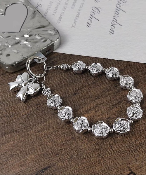 LA VORAGINE(ラ ヴォラジネ)の「ハートリボンモチーフ バッグ/モバイル マルチチャーム(チャーム・レディース・シルバー系1/シルバー/シルバー系2・FREE)」の4枚目の写真