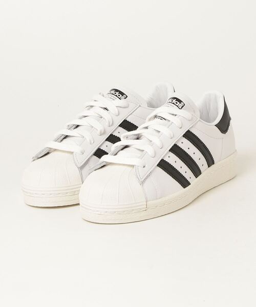 adidas Originals(アディダスオリジナルス)の「SUPERSTAR 82(スニーカー・メンズ・ホワイト系その他・26.0cm/26.5cm/27.0cm/27.5cm/28.0cm/28.5cm/29.0cm/22.5cm/23.0cm/23.5cm/24.0cm/24.5cm/25.0cm/25.5cm)」の1枚目の写真