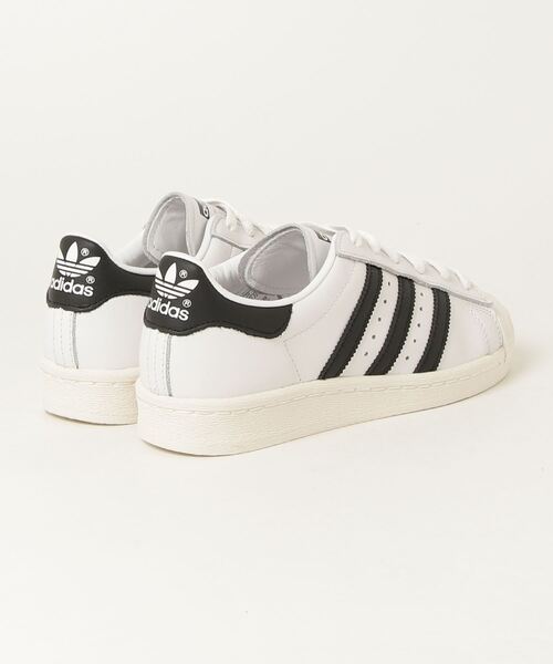 adidas Originals(アディダスオリジナルス)の「SUPERSTAR 82(スニーカー・メンズ・ホワイト系その他・26.0cm/26.5cm/27.0cm/27.5cm/28.0cm/28.5cm/29.0cm/22.5cm/23.0cm/23.5cm/24.0cm/24.5cm/25.0cm/25.5cm)」の2枚目の写真
