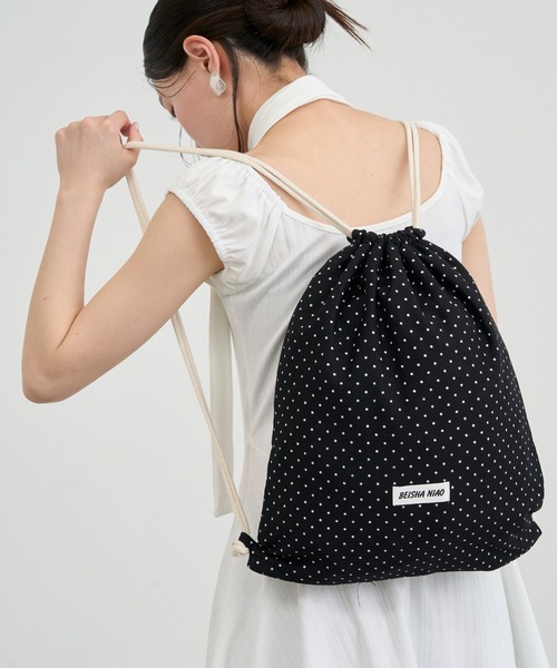 NUJOH(ヌゾ)の「Dot Drawstring Purse Bag / ドットドローストリング巾着バッグ(バックパック/リュック・レディース・ホワイト/ブラック・FREE)」の13枚目の写真