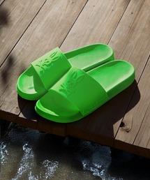 Psycho Bunny（サイコバニー）の「エンボスネオンカラーロゴ シャワーサンダル（サンダル）」