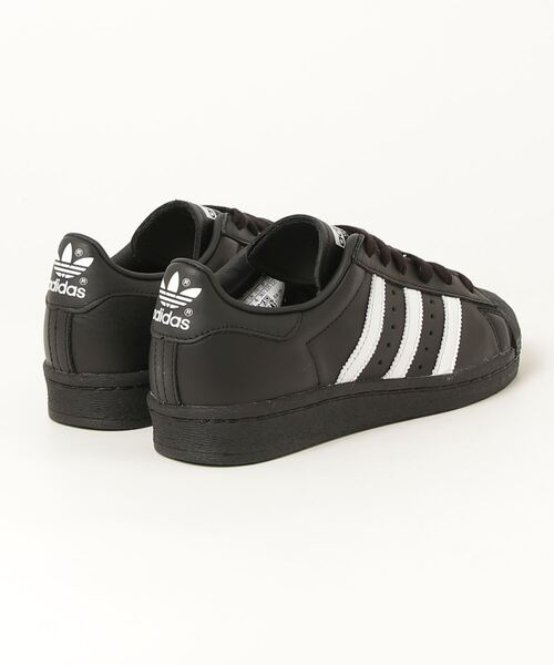 adidas Originals(アディダスオリジナルス)の「SUPERSTAR 82(スニーカー・メンズ・ブラック系その他・25.5cm/26.0cm/26.5cm/27.0cm/27.5cm/28.0cm/28.5cm/29.0cm/22.5cm/23.0cm/23.5cm/24.0cm/24.5cm/25.0cm)」の2枚目の写真
