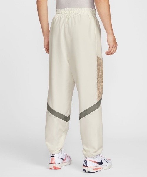 NIKE(ナイキ)の「ナイキ NIKE ナイキ ウーヴン アイコン パンツ STRTFV SN(その他パンツ・メンズ・オフホワイト・SS/S/M/L/XL/2XL/3XL)」の3枚目の写真