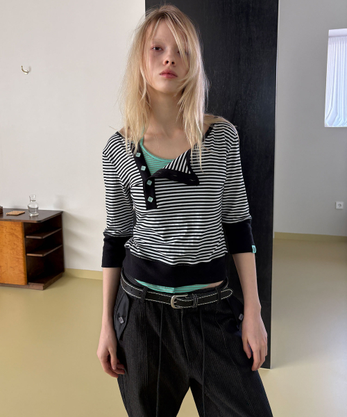 HERETIC(ヘレティック)の「BUTTON STRIPE ASYM HENLEY T-SHIRT / black(Tシャツ/カットソー・レディース・その他・FREE)」の1枚目の写真