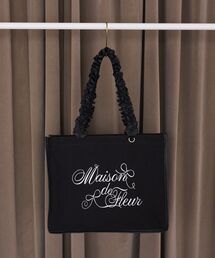 Maison de FLEUR（メゾンドフルール）の「ロゴ刺繍フリルハンドル帆布キャリーオンバッグ（トートバッグ）」
