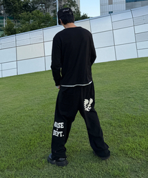 SUPERSUB（スーパーサブ）の「NOISE DEPT イーグル ワイド スウェットパンツ-ブラック（スウェットパンツ）」