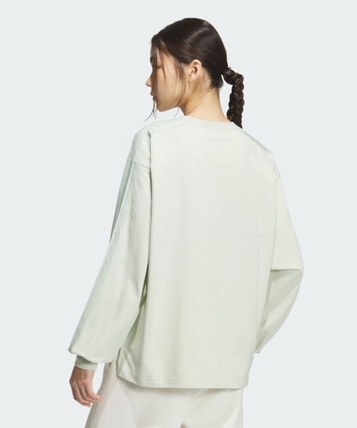 adidas(アディダス)の「エッセンシャルズ プラス スリー ストライプス ルーズ フィット 長袖 Tシャツ / ロンT / アディダス adidas(Tシャツ/カットソー・レディース・グリーン・XX-LARGE/LARGE/MEDIUM/SMALL/X-LARGE/X-SMALL)」の2枚目の写真