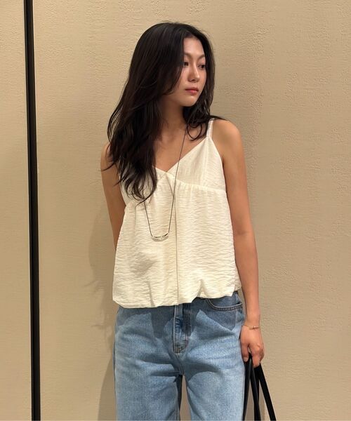 URAGO(ユラーゴ)の「Curved washing denim pants(デニムパンツ・レディース・ブルー・SMALL/MEDIUM/LARGE)」の8枚目の写真