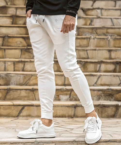 1PIU1UGUALE3  RELAX （ウノピゥウノウグァーレトレ リラックス）の「1PIU1UGUALE3 RELAX(ウノピゥウノウグァーレトレ リラックス)ダメージジョグデニムジョガーパンツ（デニムパンツ・メンズ・ブラック/ホワイト・S/M/L/XL/XXL）」の3枚目の写真