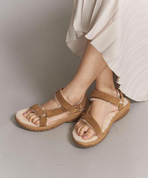Teva(テバ)の「<TEVA(テバ)>HURRICANE ハリケーン SHEARLING サンダル о(サンダル・レディース・ベージュ/ブラック・6/8/7/5)」の1枚目の写真