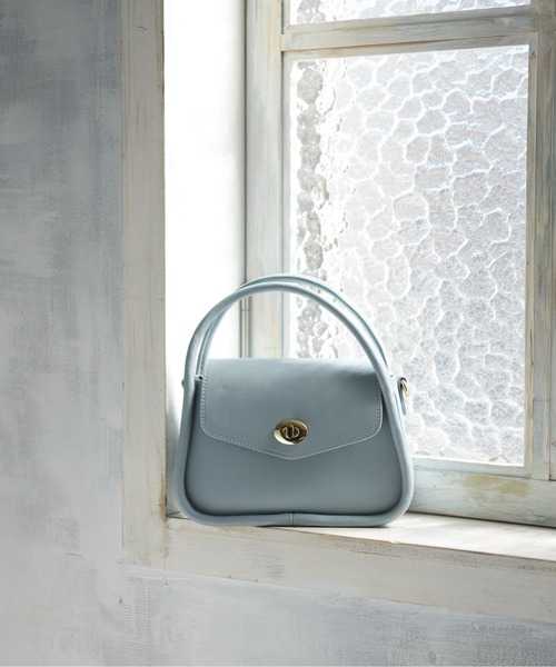 ems excite(エムズエキサイト)の「アーチハンドルミニBAG(ハンドバッグ・レディース・ブラック/オフホワイト/ブルー・FREE)」の1枚目の写真