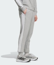 エッセンシャルズ プラス レギュラーフィット スリーストライプス フレンチテリー フルレングス カフ パンツ / アディダス adidas