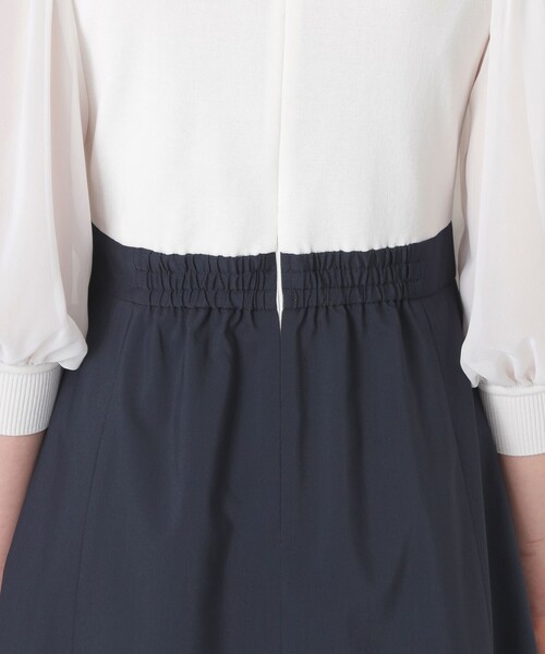 BLUE LABEL CRESTBRIDGE(ブルーレーベルクレストブリッジ)の「シアースリーブニットドッキングドレス(ワンピース・レディース・ブラック/オフホワイト・36/40/38)」の6枚目の写真