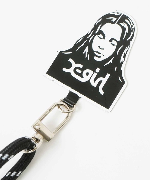 X-girl（エックスガール）の「FACE PHONE STRAP（スマホグッズ・レディース・ブラック・ONE SIZE）」の4枚目の写真