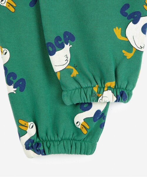 BOBO CHOSES（ボボショーズ）の「総柄La Oca長パンツ【キッズ】（スウェットパンツ・キッズ・グリーン・100/110/130/140/120）」の2枚目の写真