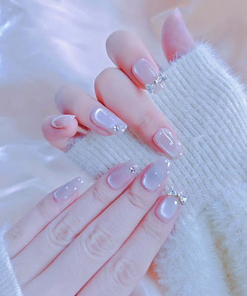 KONVINI（コンビニ）の「【not a nail】水光マグネットデザインガーリーリボンネイルチップ（ネイルシール/ネイルチップ・レディース・ライトピンク/ピンク・MEDIUM）」の3枚目の写真
