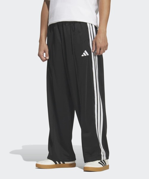 adidas(アディダス)の「スタジアム トリコット ルーズフィット ストレート レッグ パンツ / アディダス adidas(スウェットパンツ・メンズ・ブラック×ホワイト・XX-LARGE/3XL/LARGE/MEDIUM/SMALL/X-LARGE/X-SMALL)」の1枚目の写真