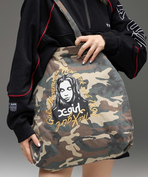 X-girl(エックスガール)の「HAND DRAWN LOGO AND FACE TOTE BAG(トートバッグ・レディース・レオパード/ブラック/カモフラージュ・ONE SIZE)」の1枚目の写真