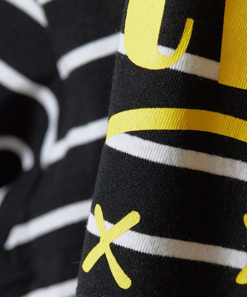 Chick（チック）の「NIRVANA / ニルヴァーナ "Classic Happy Face" Black & White Striped T-shirt クラシックハッピーフェイス ボーダー Tシャツ 前面プリント 長袖 クルーネック ロンT バンドT メンズ レディース 2026年 秋 秋服 冬 冬服（Tシャツ/カットソー・メンズ・ブラック・M/L/XL）」の2枚目の写真
