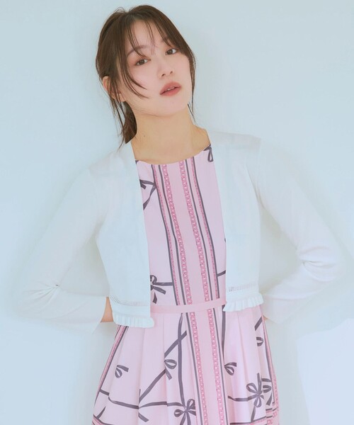 TOCCA(トッカ)の「TINY FRILL BOLERO ボレロ(カーディガン/ボレロ・レディース・アイボリー系/ライラック系/ブラック系・SMALL/MEDIUM)」の1枚目の写真