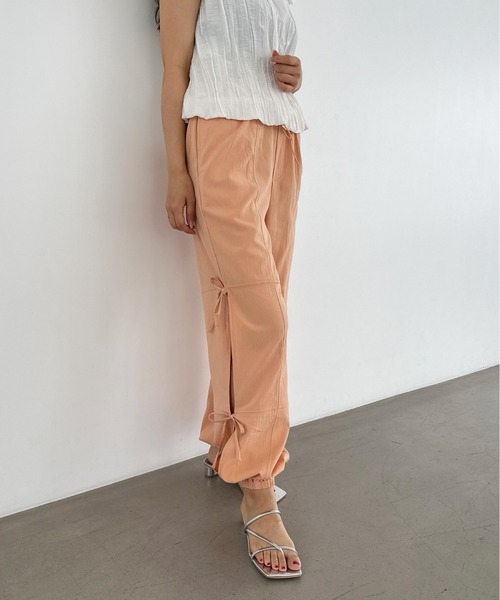 Olu.(オルドット)の「サイドリボンジョガーパンツ(その他パンツ・レディース・オレンジ/オフホワイト・FREE)」の12枚目の写真