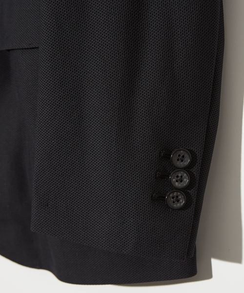DESIGNWORKS(デザインワークス)の「【ポルシェチームEBIコラボ /セットアップ対応】40周年 フェザートリコット メッシュ ジャケット / 収納ケース付き(テーラードジャケット・メンズ・ブラック・46/44/52/50/48)」の10枚目の写真
