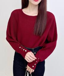 袖ボタンドルマンニット