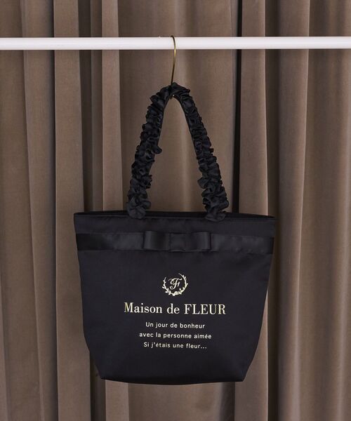 Maison de FLEUR(メゾンドフルール)の「ブランドロゴフリルハンドルトートMバッグ(トートバッグ・レディース・ピンク系その他2/ピンク/ブラック・FREE)」の1枚目の写真