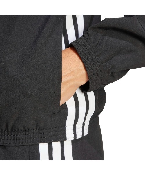 adidas(アディダス)の「アディダス adidas トレイン エッセンシャルズ スリーストライプス ウーブン ウォームアップジャケット(ジャージ・レディース・ベージュ/ブラック・S/M/L)」の10枚目の写真