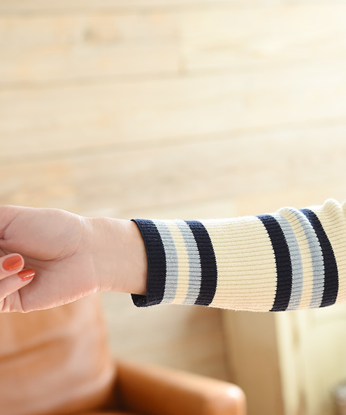 Luz Llena（ラズレナ）の「マルチボーダー柄カシュクールニットトップス（ニット/セーター・レディース・アイボリー/イエロー/オレンジ・MEDIUM）」の11枚目の写真