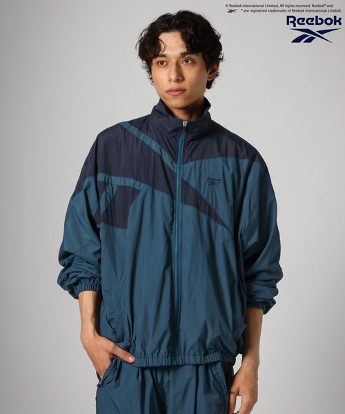 Reebok(リーボック)の「【Reebok】別注トラックジャケット(ナイロンジャケット・メンズ・ホワイト/レッド/ネイビー/グリーン/ブラック系/パープル/オフホワイト/グレー/ブラック/ホワイト×レッド/ブラック×グレー/ダークグリーン/ブラック系その他/ブルー系その他/ホワイト系その他/シルバー/ブラック系その他2/ホワイト×ブルー/ブルー/ピンク/ブラウン/ターコイズブルー・MEDIUM/LARGE)」の17枚目の写真