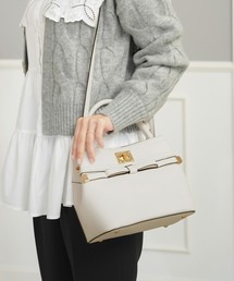 le reve vaniller（ル レーヴ ヴァニレ）の「フロントリボン ハンド バッグ le reve vaniller（ボディバッグ/ウエストポーチ）」