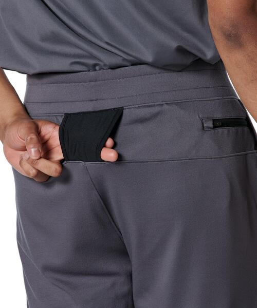 UNDER ARMOUR(アンダーアーマー)の「UAモチベート パンツ(トレーニング/メンズ)(その他パンツ・メンズ・グレー×ホワイト・M/L/2XL/XL/5XL/3XL/S)」の5枚目の写真