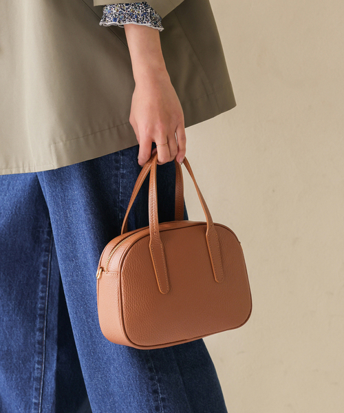 MARCO BIANCHINI(マルコビアンチーニ)の「MARCO BIANCHINI SLOBE別注 ラウンドボストンバッグ ECHO OF PETALS 25107(ボストンバッグ・レディース・キャメル/ブラック・FREE)」の1枚目の写真