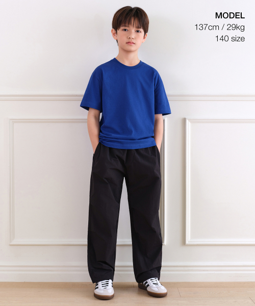 MUSINSA STANDARD KIDS（ムシンサスタンダードキッズ）の「ナイロンバンディングパラシュートパンツ[ブラック]（スウェットパンツ・レディース・その他・100/110/120/130/140/150/160）」の2枚目の写真