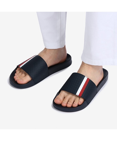 TOMMY HILFIGER(トミーヒルフィガー)の「コーポレートモノグラムスライドサンダル(サンダル・メンズ・ホワイト/ネイビー・26cm/26.5cm/27.5cm)」の9枚目の写真