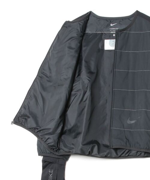 NIKE(ナイキ)の「ナイキ NIKE ナイキ スイフト TF フィル ジャケット I2SP(ノーカラージャケット・レディース・ブラック/ブルー・M/L/XL)」の4枚目の写真