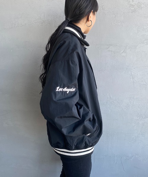 VISION STREET WEAR（ヴィジョンストリートウェア）の「【WEB限定】[VISION STREET WEAR/ビジョン ストリート ウェアー] ワッペンデザイン ナイロンコーチスタジャン（スタジャン・レディース・グリーン/ブラック・M/L）」の11枚目の写真