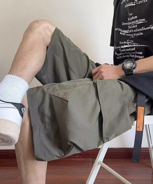 link lot(リンクロット)の「ウェビングベルト付き テック ワイドカーゴハーフショートパンツ(カーゴパンツ・メンズ・アイボリー/カーキ/ブラック・L/M)」の15枚目の写真