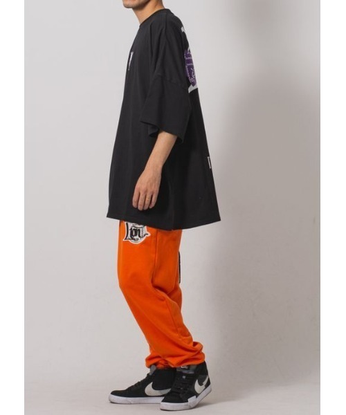 RE730（アールイーセブンサーティー）の「【RE730】ワッペン付きジョガーパンツ　ユニセックス（その他パンツ・メンズ・ブラック/アイボリー/オレンジ/ブルー・LARGE/MEDIUM/SMALL）」の14枚目の写真