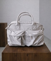 UNDERSTATEMENTs（アンダーステイトメント）の「2WAYナイロンダブルポケットボストンバッグ/ロゴプレート付き（ボストンバッグ）」